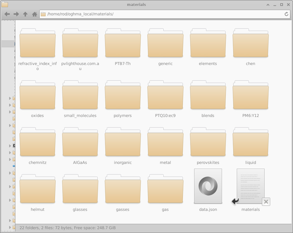 Screenshot of the materials directory within oghma_local, showing folders for different material categories such as metals, oxides, polymers.
