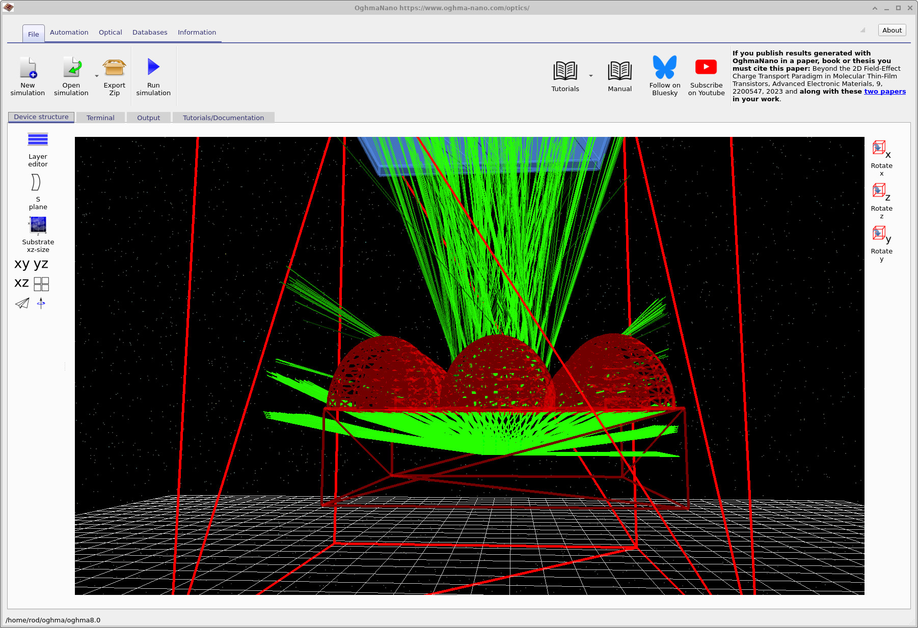 Ray tracing with wider angular emission showing rays escaping sideways and only a fraction reaching the detector.