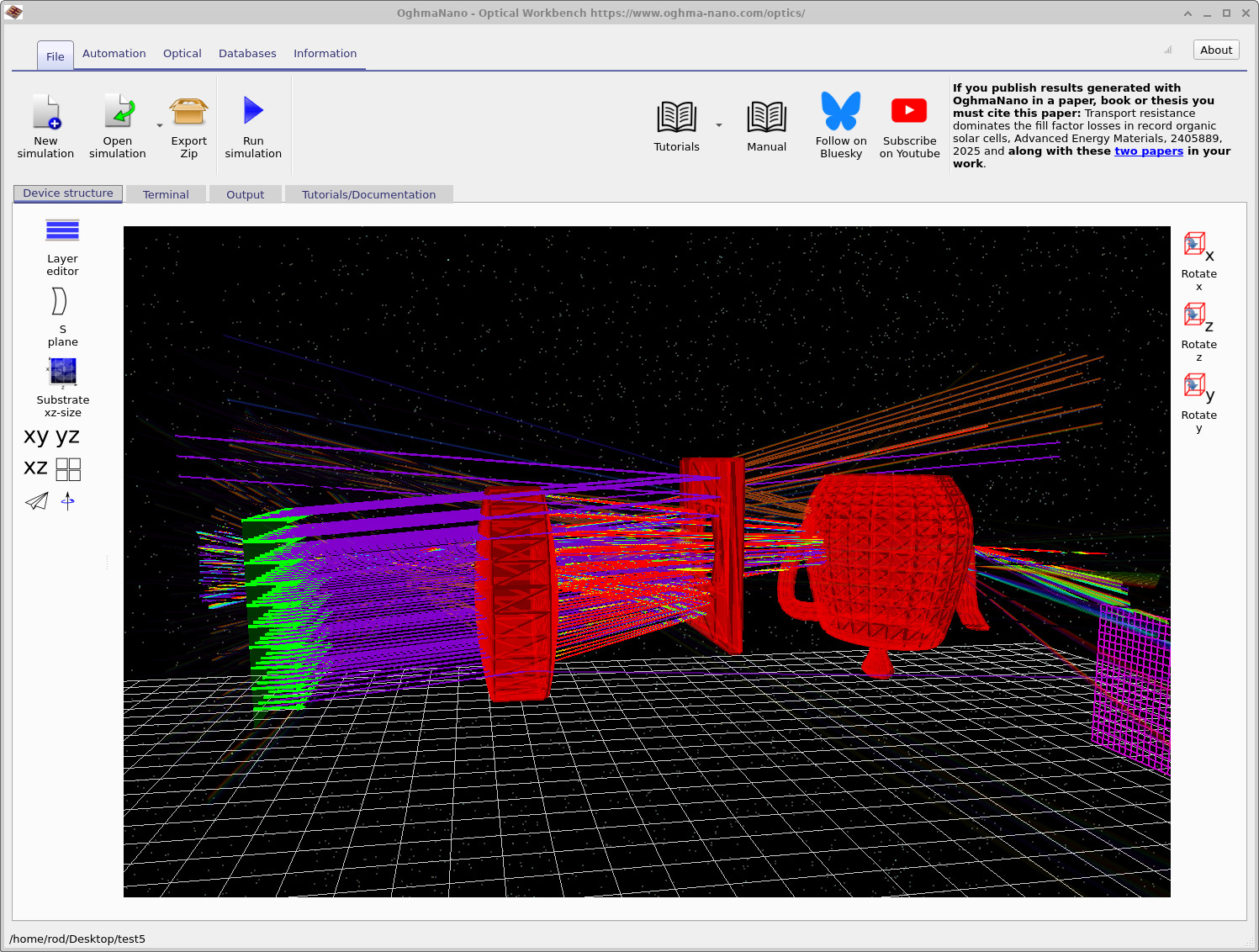 Ray-tracing scene with rays passing through the lens, aperture and teapot before reaching the detector